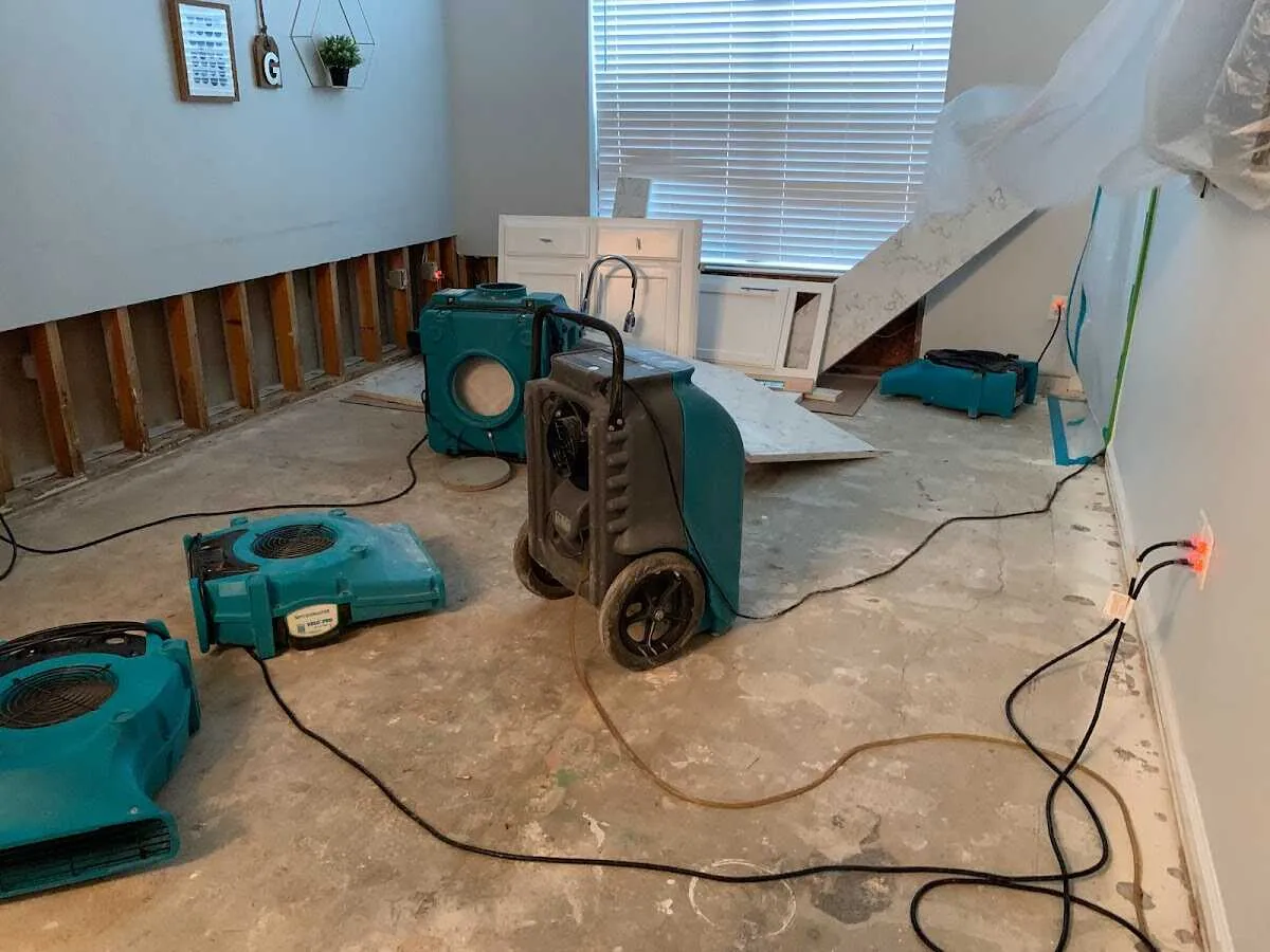Dehumidifier in flood-cut room for Water Damage Restoration in Edgemere